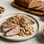 Vitamin B1-rich foods including pork, fish, whole grains, beans, nuts and seeds