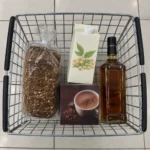 A shopping basket holding bread, soy milk, cocoa mix and spirits, all classed as ultra-processed food in the study.